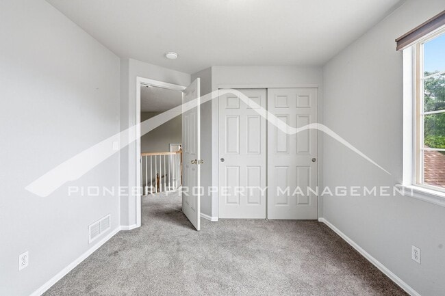 Building Photo - Spacious Home with Central AC and Fenced Yard