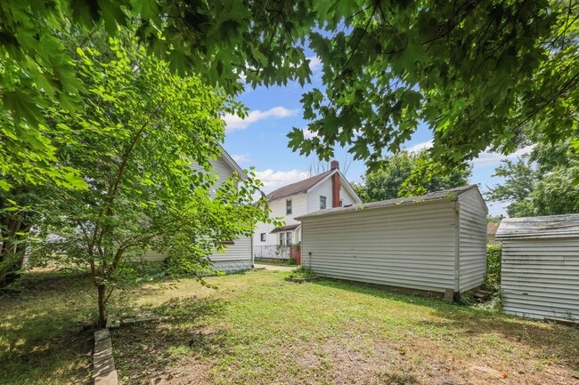Building Photo - Bright living ? cozy dining flow for everyday comfort and easy entertaining.