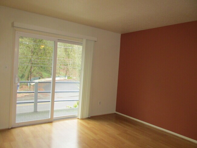 Living room with balcony view - 2836 SW Sam Jackson Park Rd