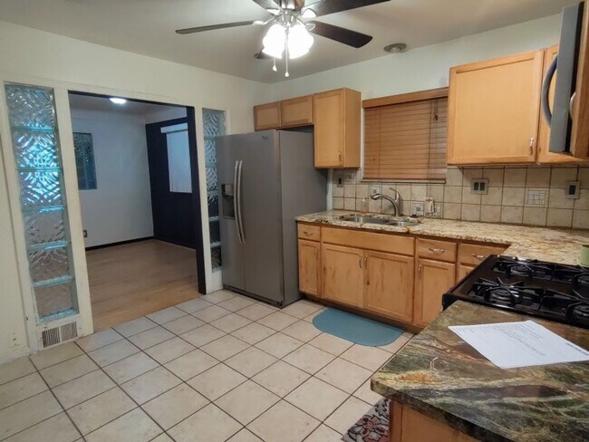 Building Photo - Beautiful, sprawling, brick ranch - $1700/mo