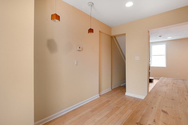 Building Photo - Spacious 2BR/2.5BA Townhome with Finished Basement & Extra Storage