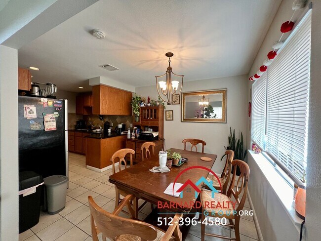 Building Photo - Available July 18: 3 bedroom, 2.5 Bath Duplex with Garage and Fenced Yard