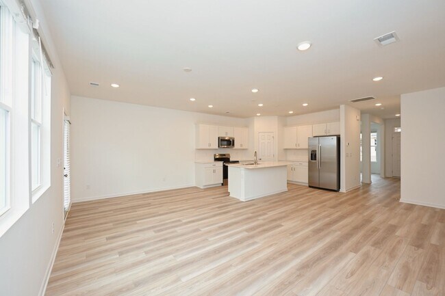 Building Photo - **BE THE FIRST PERSON TO LIVE IN THIS BRAND NEW BRICK TOWNHOME IN THE VILLAS AT REGAL SQUARE FEAT...