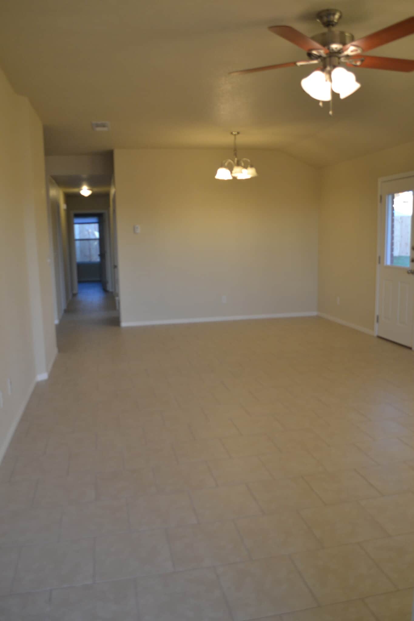 Living/dining room and back door - 220 Ryan Cir Apt B