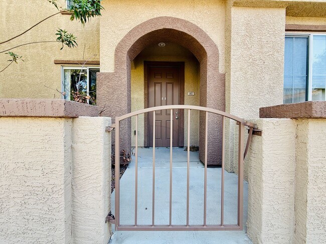 Building Photo - Immaculate and Inviting Two-Story Condo in Lone Mountain Available! 1/2 OFF THE FIRST FULL MONTH'...