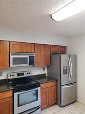 Kitchen with all appliances - 1725 Newport Pl