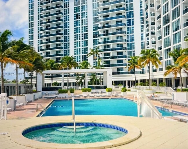 Building Photo - 10275 Collins Ave
