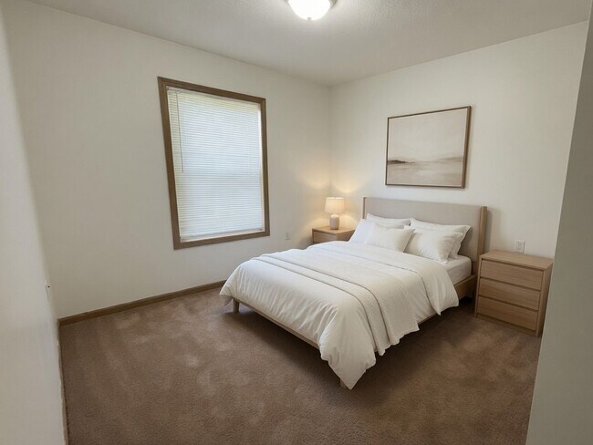 Building Photo - For Rent - 4 Bedroom, 2 Full Bath Home with Ground-Floor Bedroom, Attached Garage and Brand-New K...