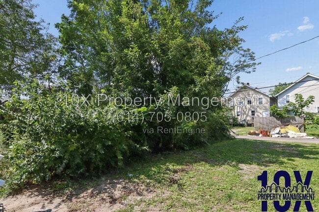 Building Photo - 1500 E 26th Ave
