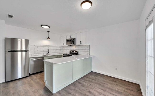 Building Photo - 5311 Tennyson Dr