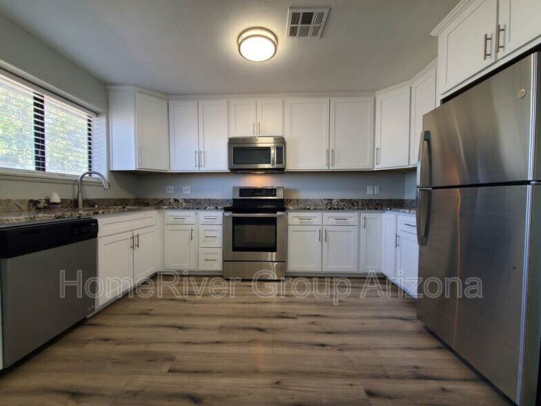 Building Photo - 4023 N 80th Dr