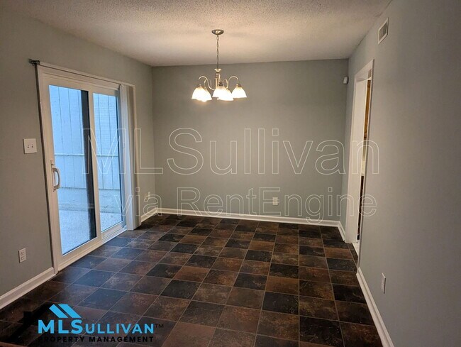 Building Photo - 4101-4105 Oaks Dr