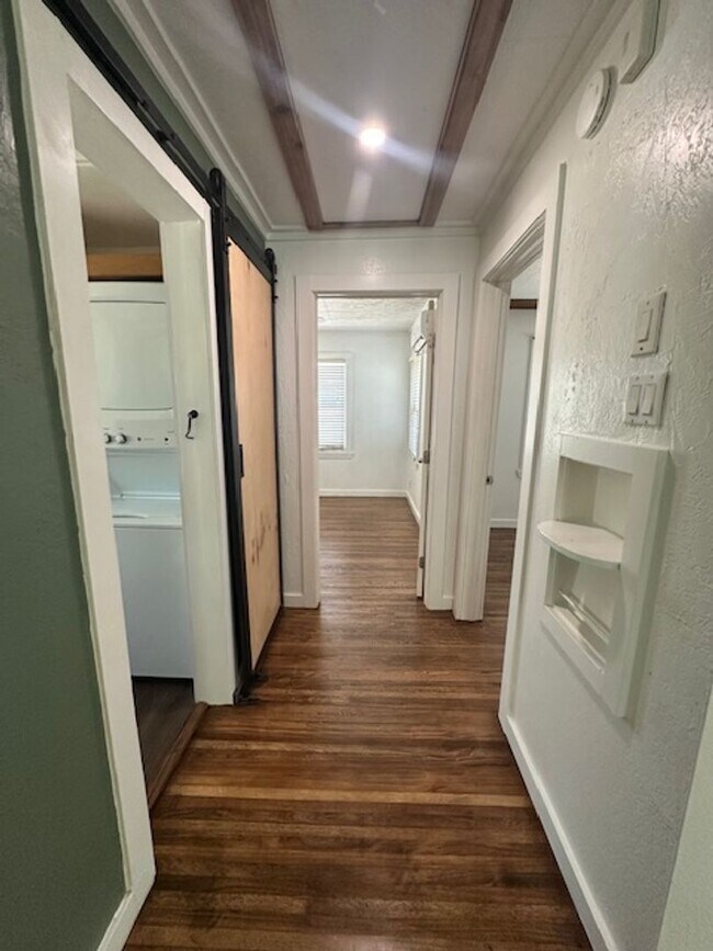 Building Photo - Updated - Wood Floors - 2/1