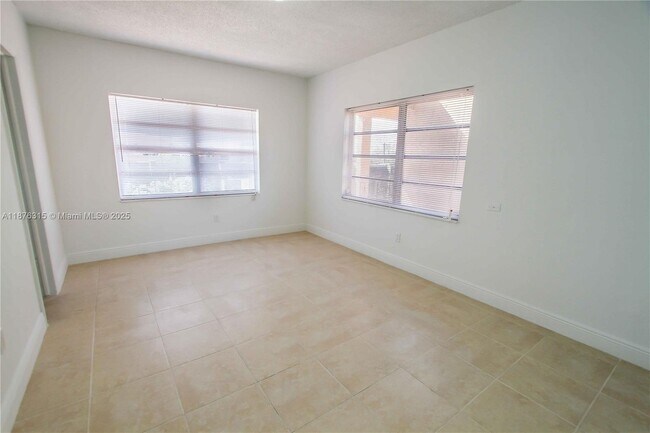 Building Photo - 3675 W 11th Ave