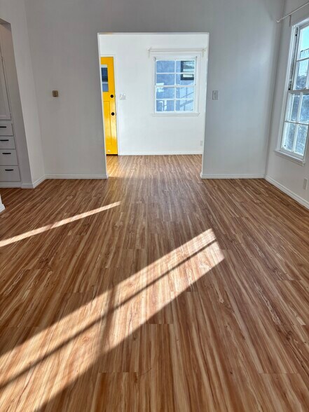 Looking from living room to dining area and front door. - 936 Palms Blvd
