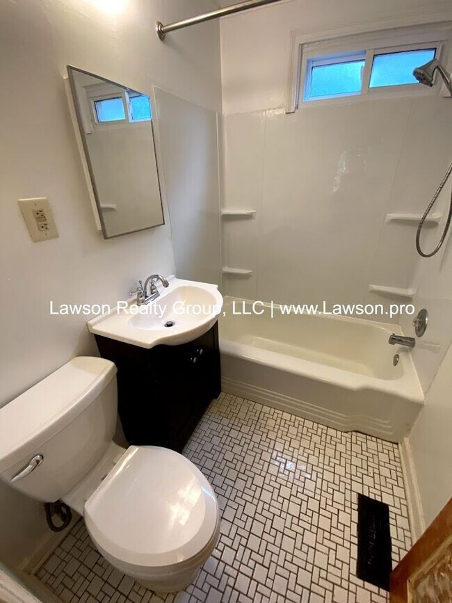 Building Photo - Adorable Cottage with Unique Interior Design and Fenced Yard