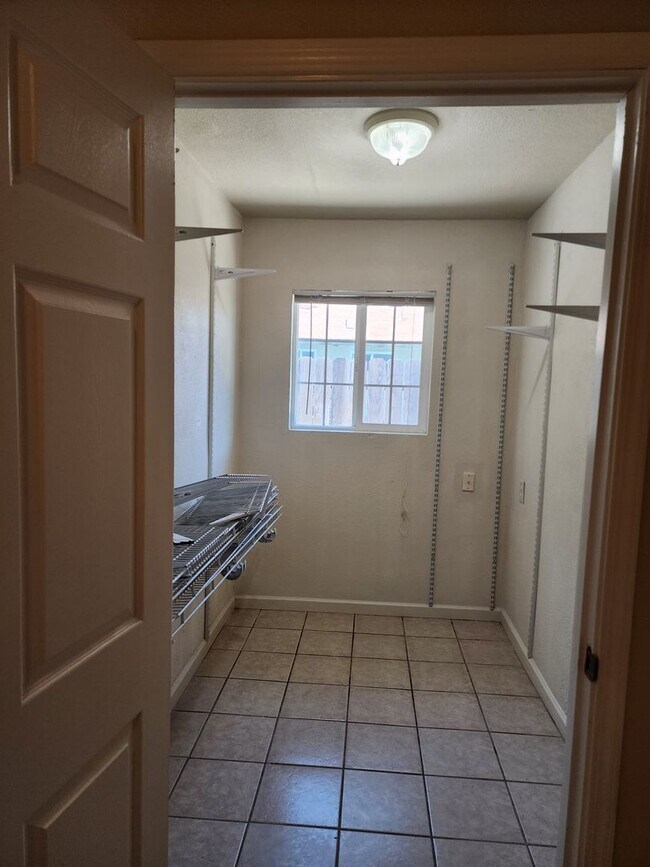 Building Photo - 3 bedroom 1 bath with Garage converted to ...