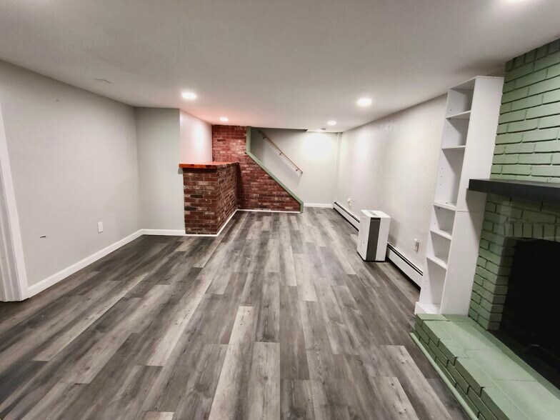 Lower Level: Den, Master with Half Bath - 28 S Spencer Rd