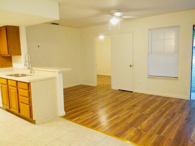 Kitchen opening to living room - 404 W 4th St