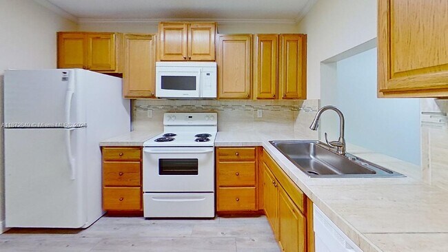 Building Photo - 7406 Woodmont Terrace