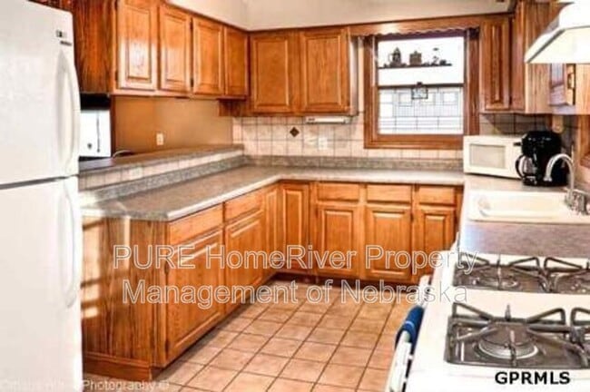Building Photo - 1009 N 49th Ave