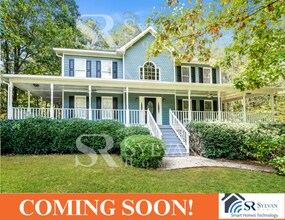 Building Photo - The living is easy in this 4 bedroom, 2.5 ...