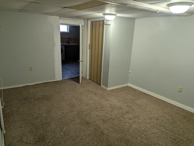 Moderate sized bedroom with built in closet. Fresh neutral paint to be completed this week. - 906 Bethel St
