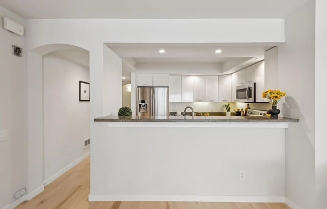 Building Photo - chic and sunny large one bedroom condo located .