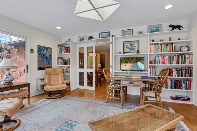 Sun room has books and games galore! - 162 Denison Dr