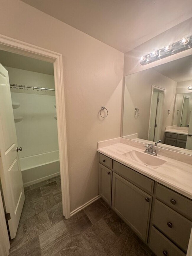 Building Photo - Storm shelter, All Appliances and security system with monitoring! 4 bed, 2 bath 2 car garage!