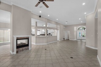 Building Photo - MOVE IN SPECIAL: 30% OFF FIRST MONTHS RENT -- Spacious unfurnished 4B/3B home in Gated Community ...