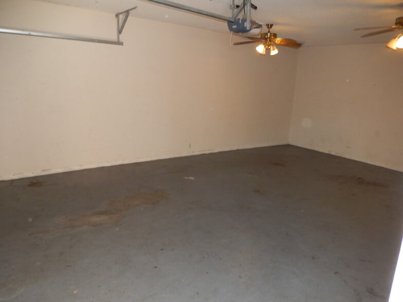 Inside of Garage with Ceiling Fans Installed - 2065 Pinemount Blvd