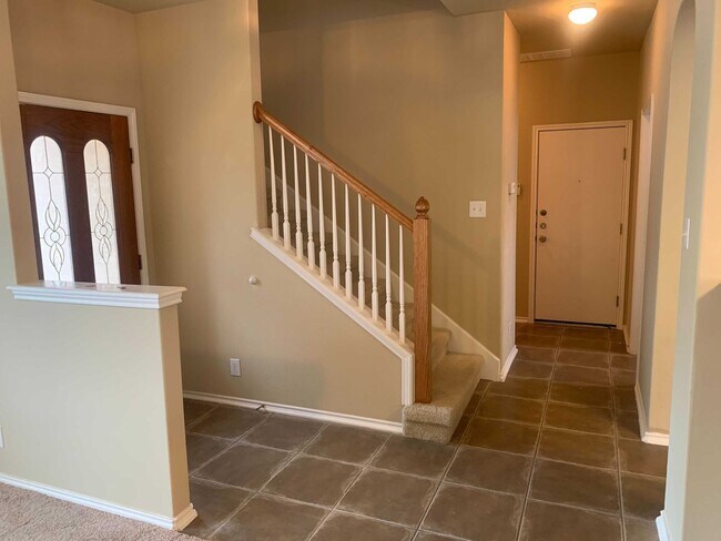 Building Photo - *COMING SOON* Gated Community: 3-Bedroom with Upstairs Loft, Fenced Backyard & Prime Location!