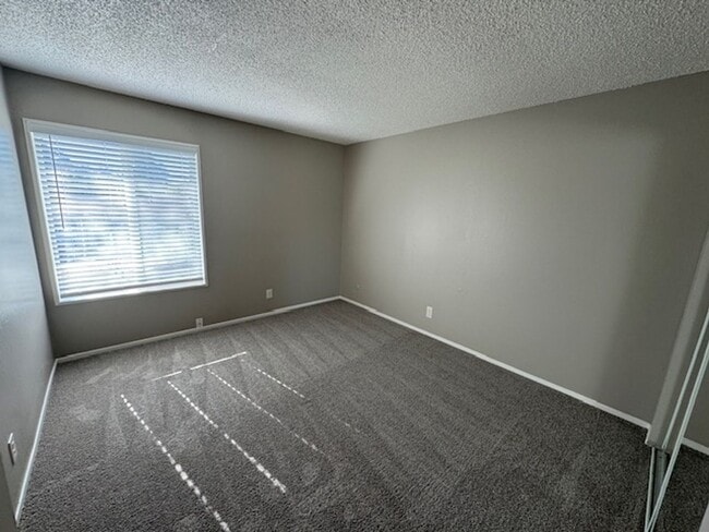 Building Photo - Fully Remodeled 3 Bedroom Townhome Available Soon!