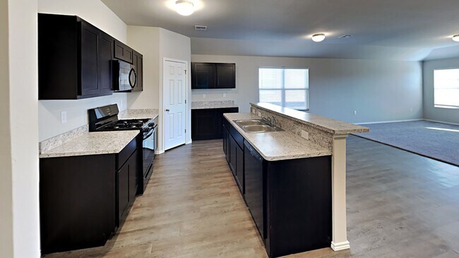 Building Photo - Very Nice and Spacious 4 Bedroom 2 Bath Home With Office/Flex Space in Yukon Schools