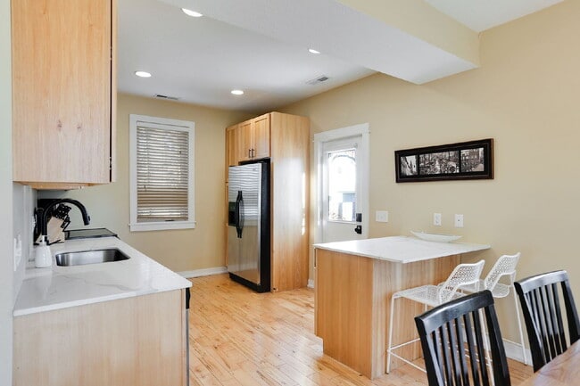 Building Photo - Charming 5-Bed Home with Hardwood Elegance in Minneapolis