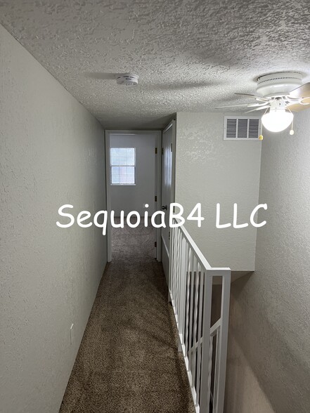 Hallway, top of stairs facing towards east bedroom - 6041 Sequoia Rd NW