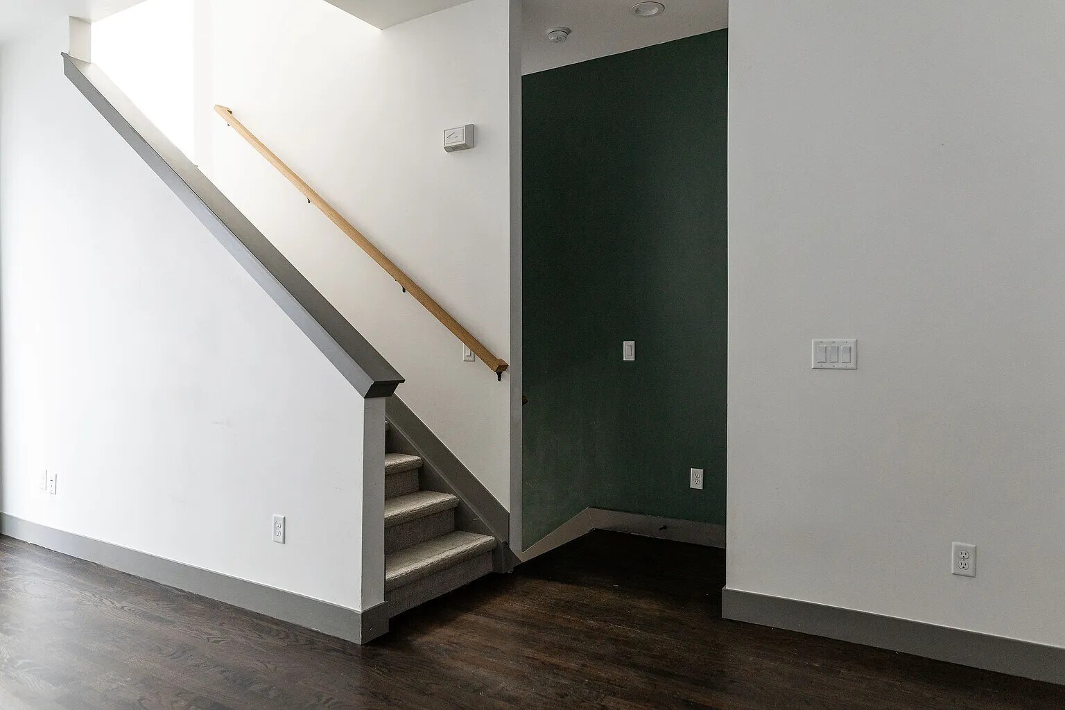 Living Room with stairs to the mudroom and up to the bedrooms - 3505 S Marion St
