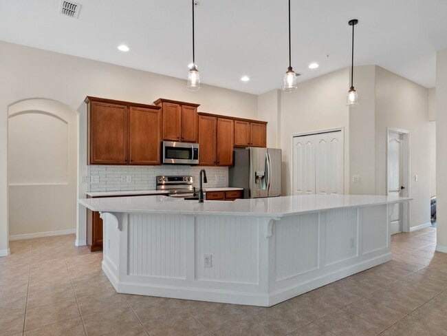 Building Photo - Spacious 4-Bedroom Pool Home with 3 Full B...