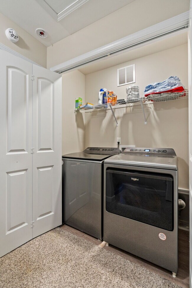 Building Photo - Available Now! Enjoy low-maintenance coastal living in this beautiful 2-bedroom, 2.5-bath townhom...