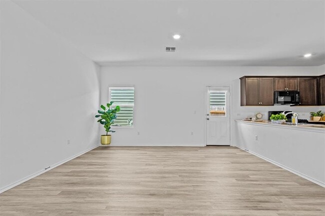 Building Photo - 7711 Poppy Petal Dr