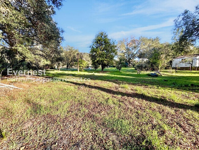 Building Photo - 6489 Rainbow Heights Rd