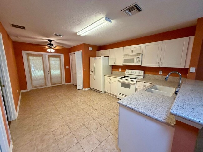 Building Photo - Close to Pier Park, Palmetto Trace HOA community with pool