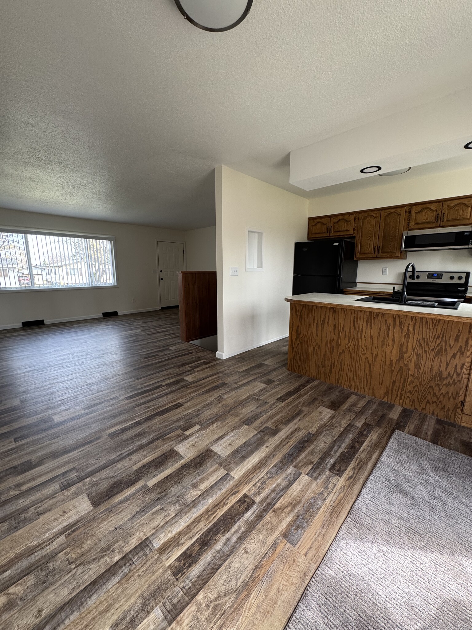 Dining and living rooms - 825 11th Ave W