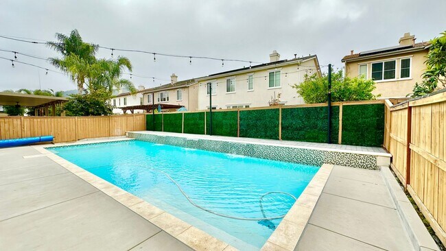 Building Photo - Beautifully Updated Two-Story Home in Lake Rancho Viejo Community, complete with Pool & Solar!