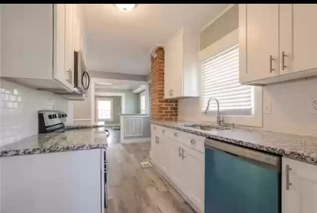 Building Photo - 5519 Highland Ave