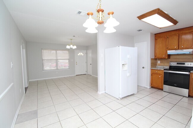 Building Photo - Charming 3-Bedroom Brick Home on Half an A...