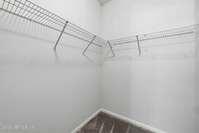 Building Photo - Ground Floor 2 bedroom 2 bathroom Condo in Gated Community with Amenities