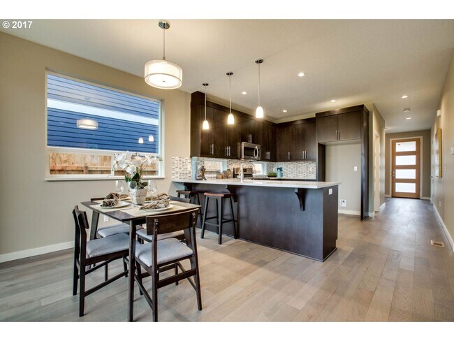 Building Photo - Charming 3BR Home with Fireplace, Bright Open Living Spaces & Loft