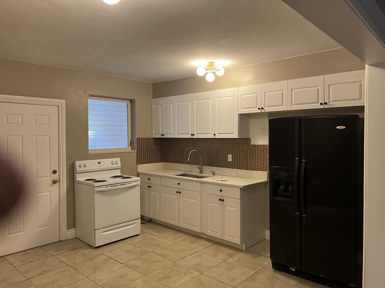 Large modern eat in Kitchen. - 1864 NW 93rd St